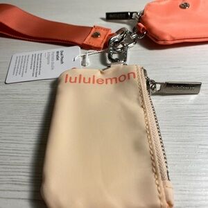 Lululemon Athletica Peach and Coral Wristlet